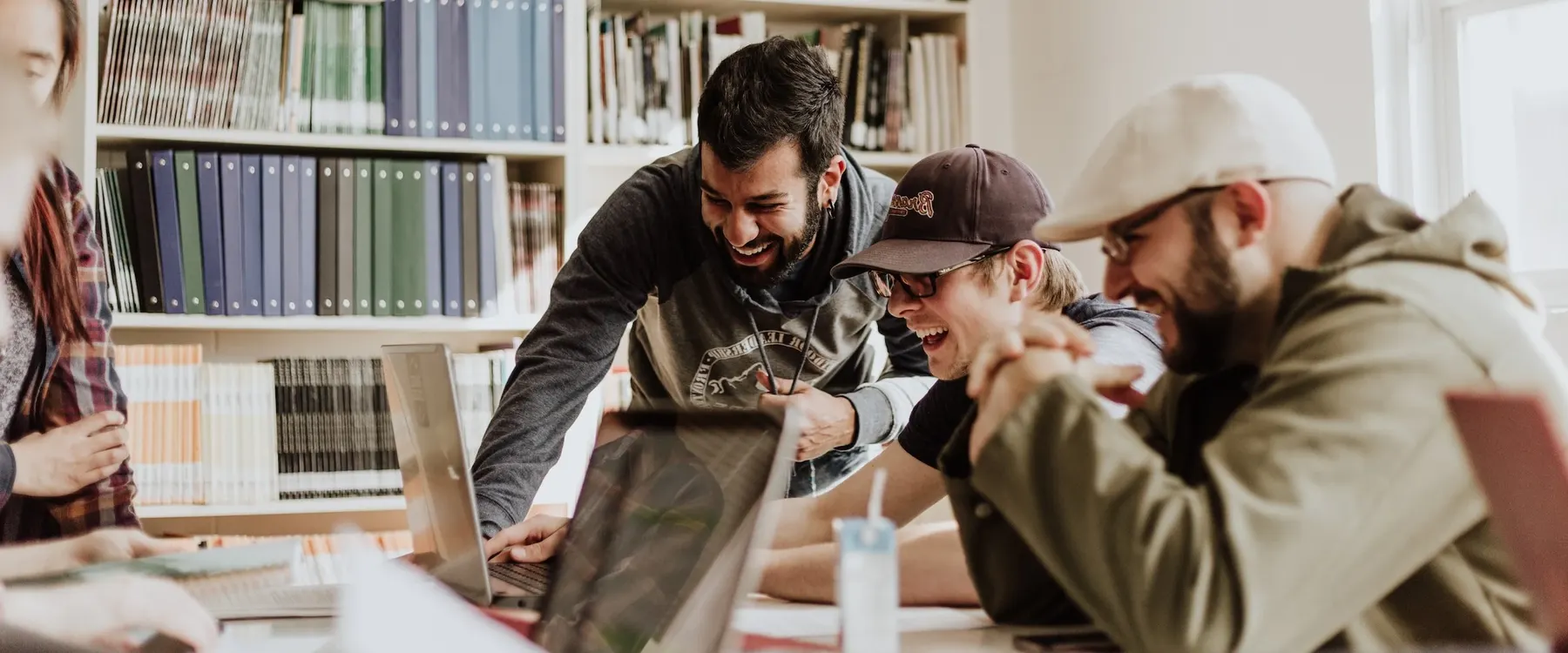 Researchers collaborating around a table